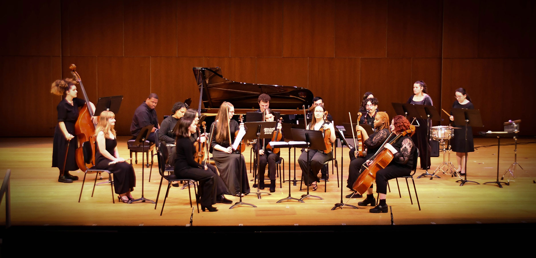 Molloy students performing in a ensemble 