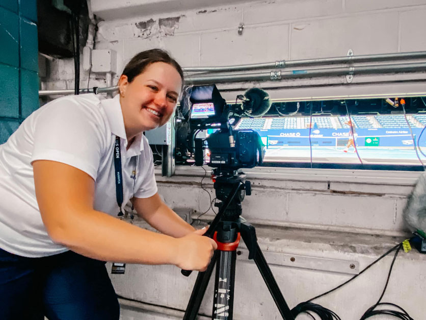 Bernadette Conway in the Photographers pit filming the U.S. Open